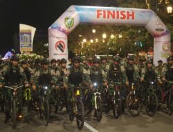 Yonif 501 Kostrad Laksanakan Gowes Malam Beserta Ribuan Masyarakat Kota Madiun