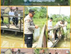 Dukung Ketahanan Pangan, Polres Konawe Selatan Tabur Seribu Benih Ikan